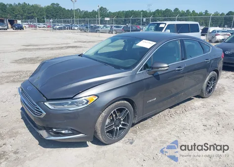 2018 Ford Fusion Hybrid Titanium z USA, uszkodzony, nr VIN 3FA6P0RU9JR207022